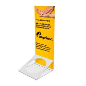 Modelo de display de mesa para álcool gel, com suporte para para o frasco de álcool gel. Na testeira, uma arte que sugere a melhor forma de uso para o produto, com textos e referências da Imprima.vc